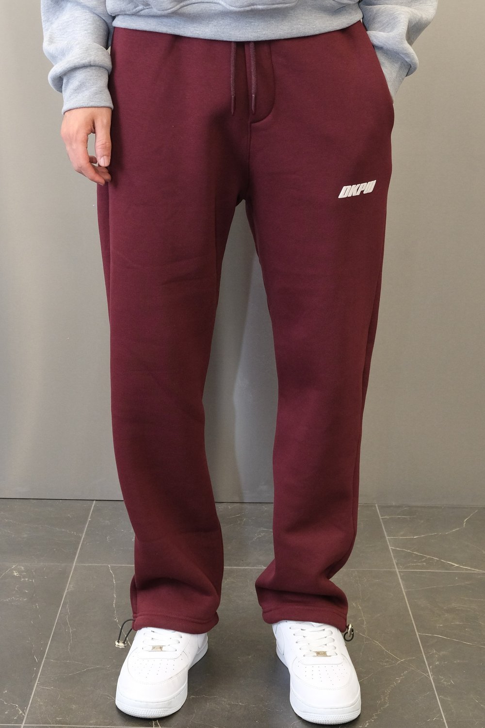 DKPW KABARTMA BASKILI BAGGY KALIP ŞARDONLU EŞOFMAN ALTI BORDO