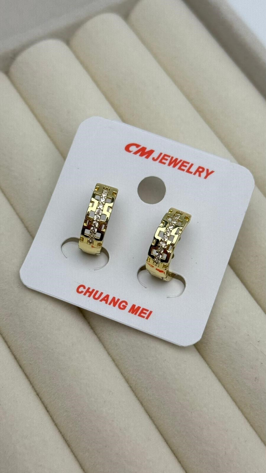 CM Küpe