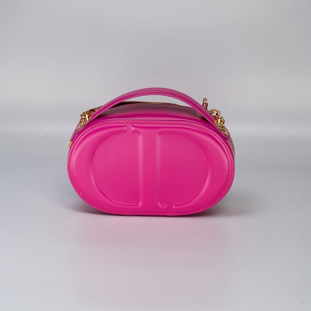 DIOR CD SIGNATURE OVAL CAMERA BAG – RANI PINK