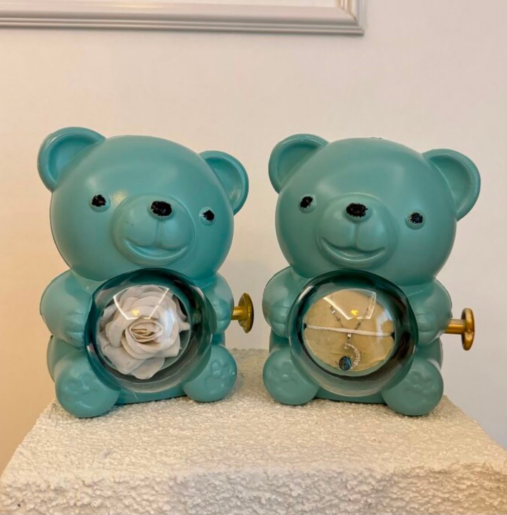 Dönen güllü ayıcık kutusunda çelik kolye (çantalıdır)