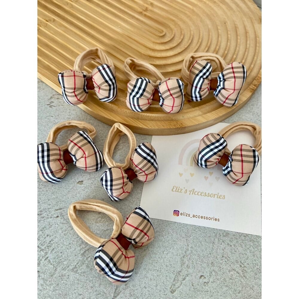 BURBERRY MODEL FİYONK LASTİK TOKA