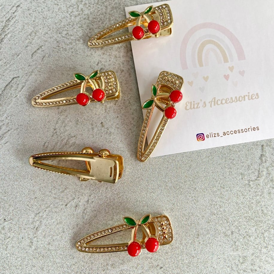 KİRAZ DETAYLI TAŞLI GOLD METAL PENS TOKA