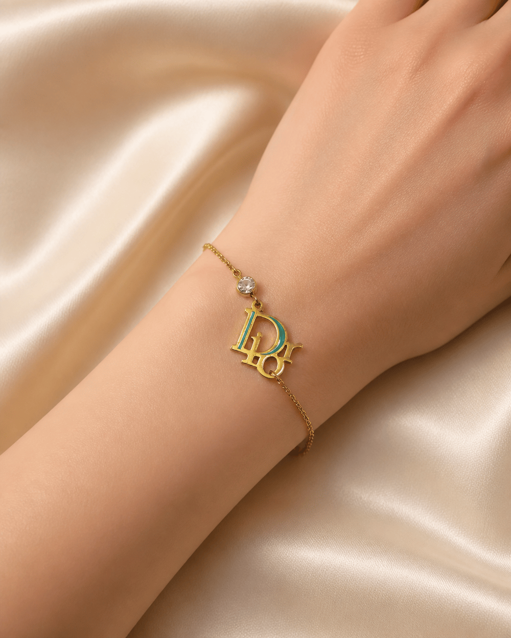 Titanyum Altın Renk Turkuaz Detaylı Monogram Bileklik