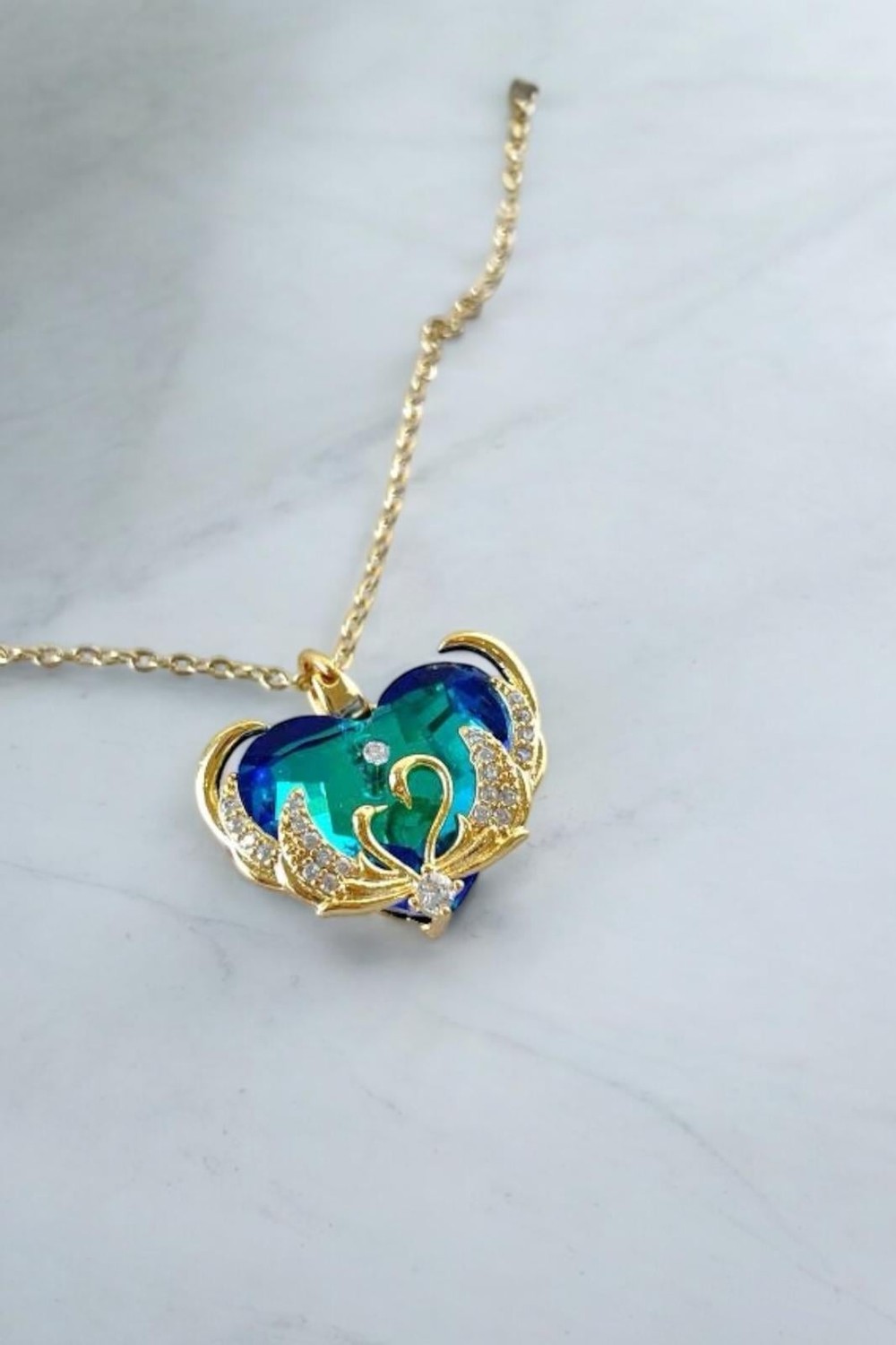 Çelik İkili Kuğu Detaylı Mavi Kristal Kalp Kolye Gold