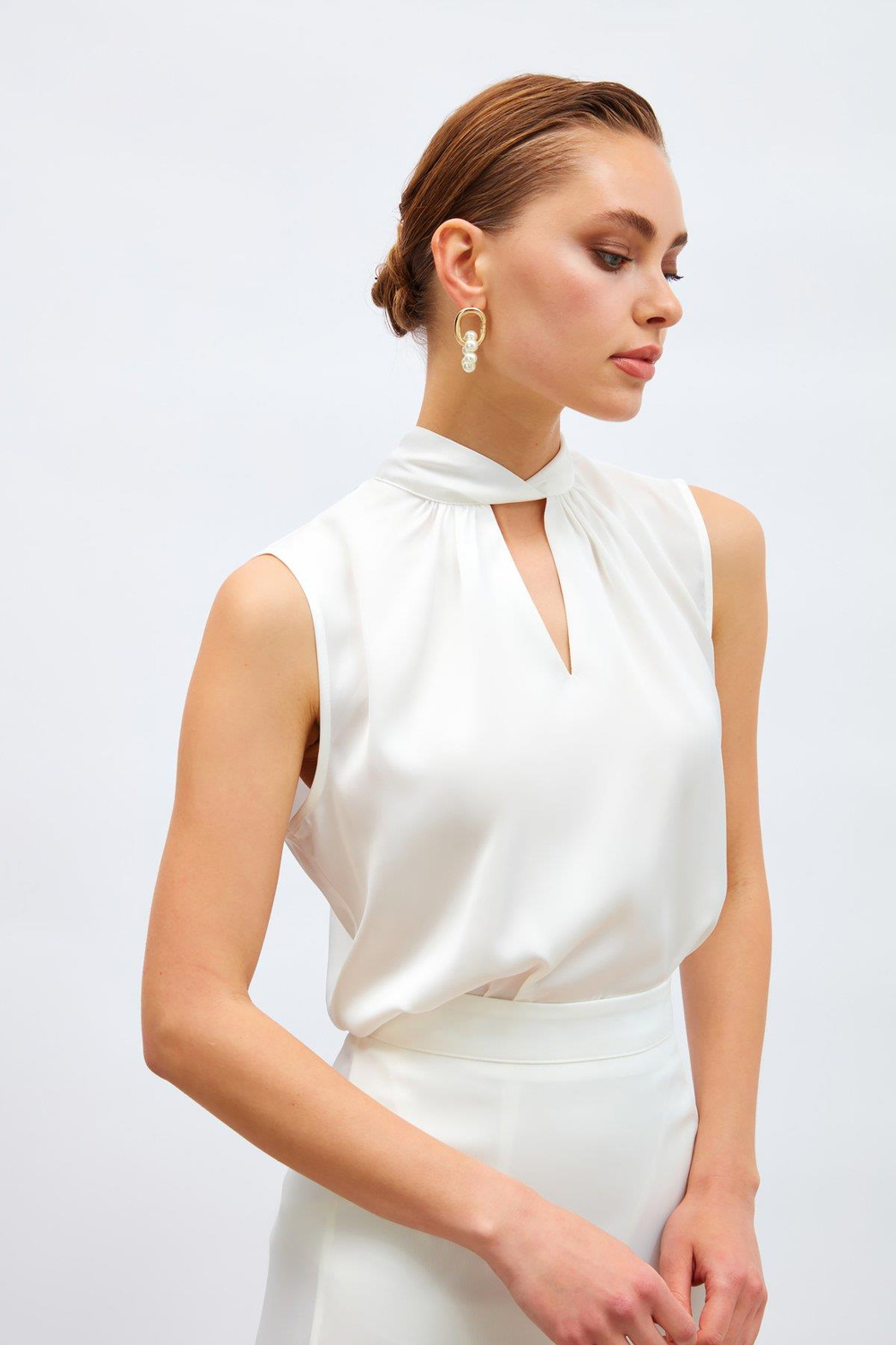 Wholesale Womens Ecru Sleeveless Mock-Neck Satin Blouse