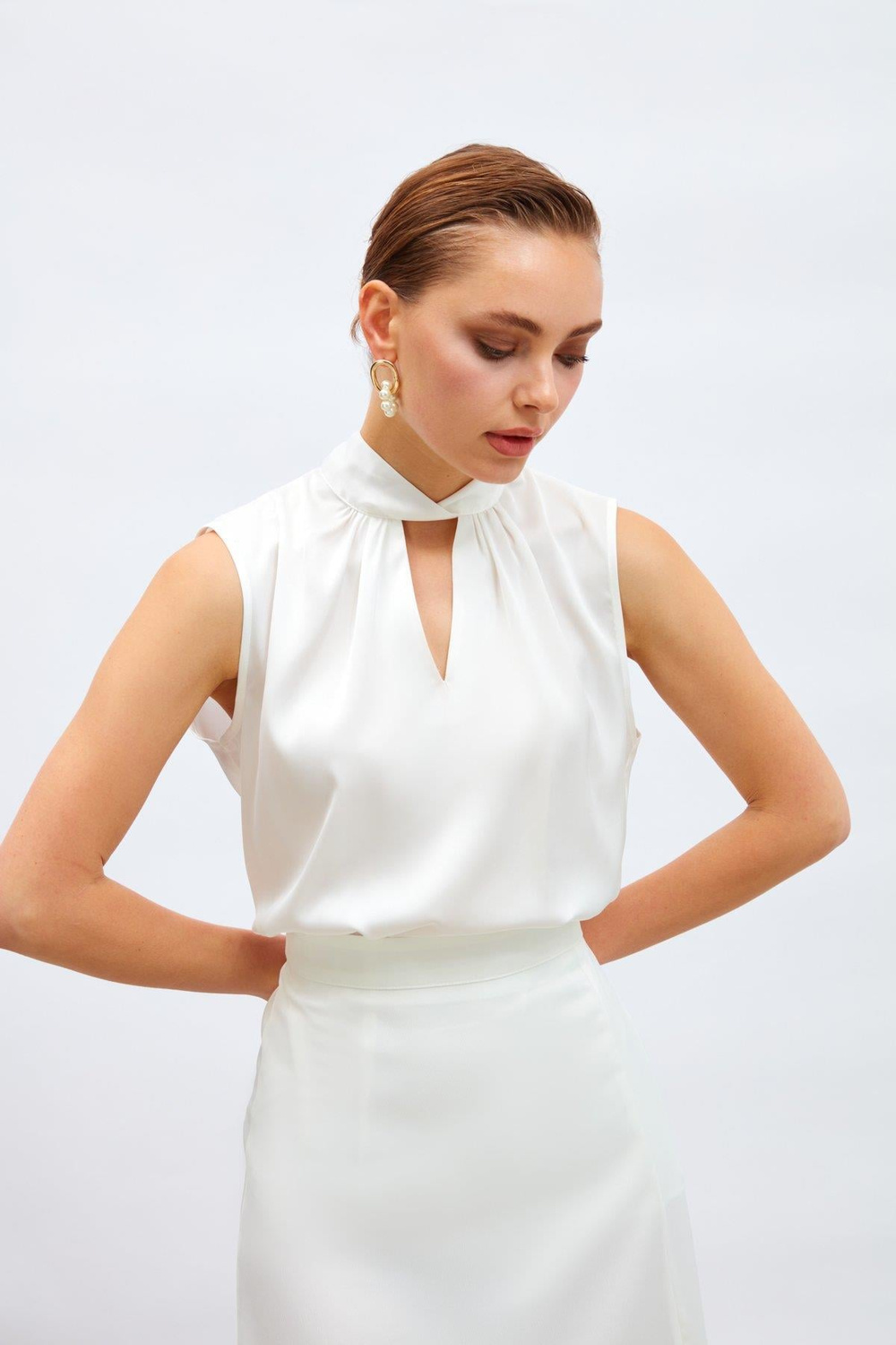 Wholesale Womens Ecru Sleeveless Mock-Neck Satin Blouse