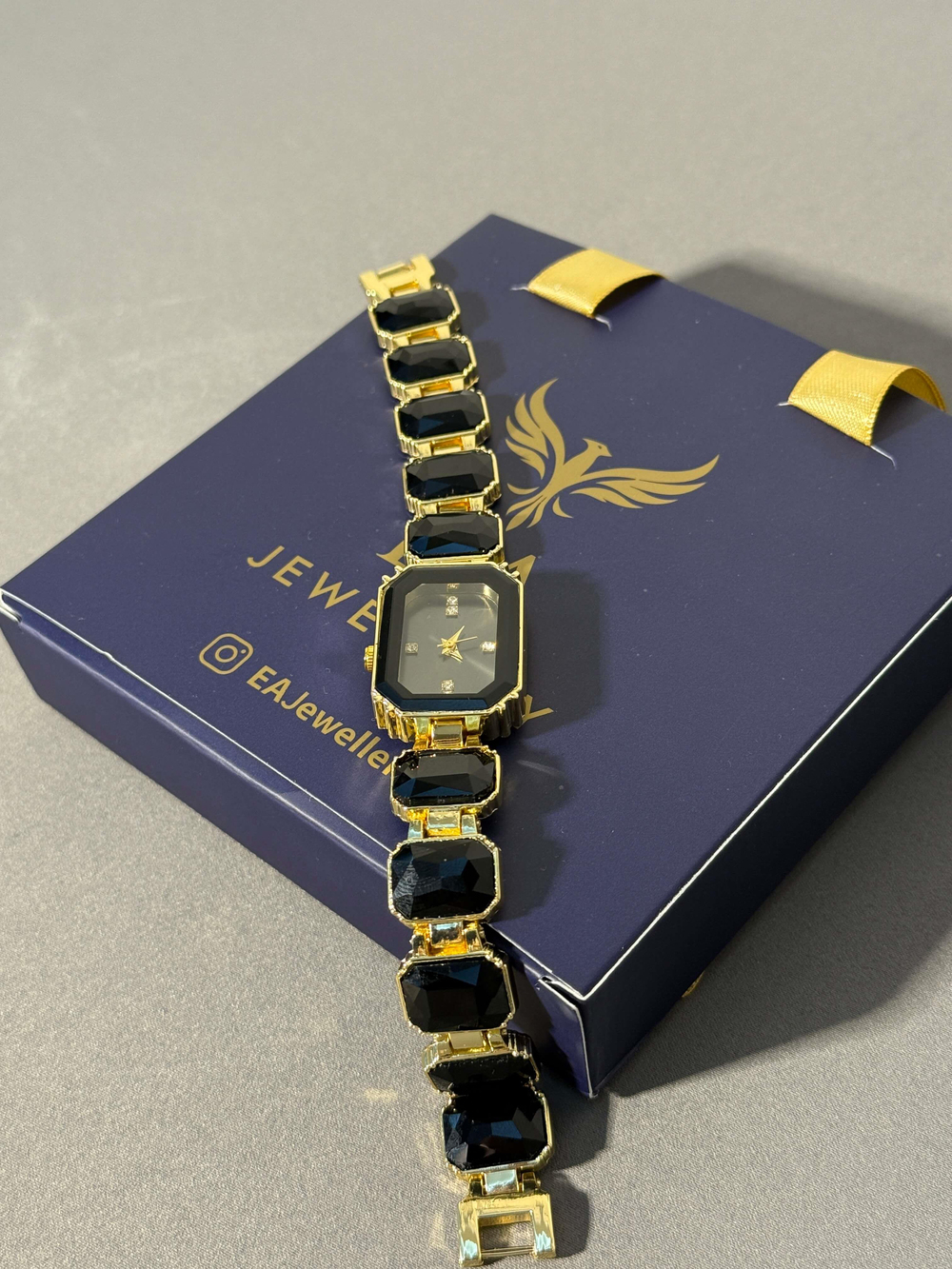 SWAROWSKI MODEL SIYAH GOLD DETAY SAAT