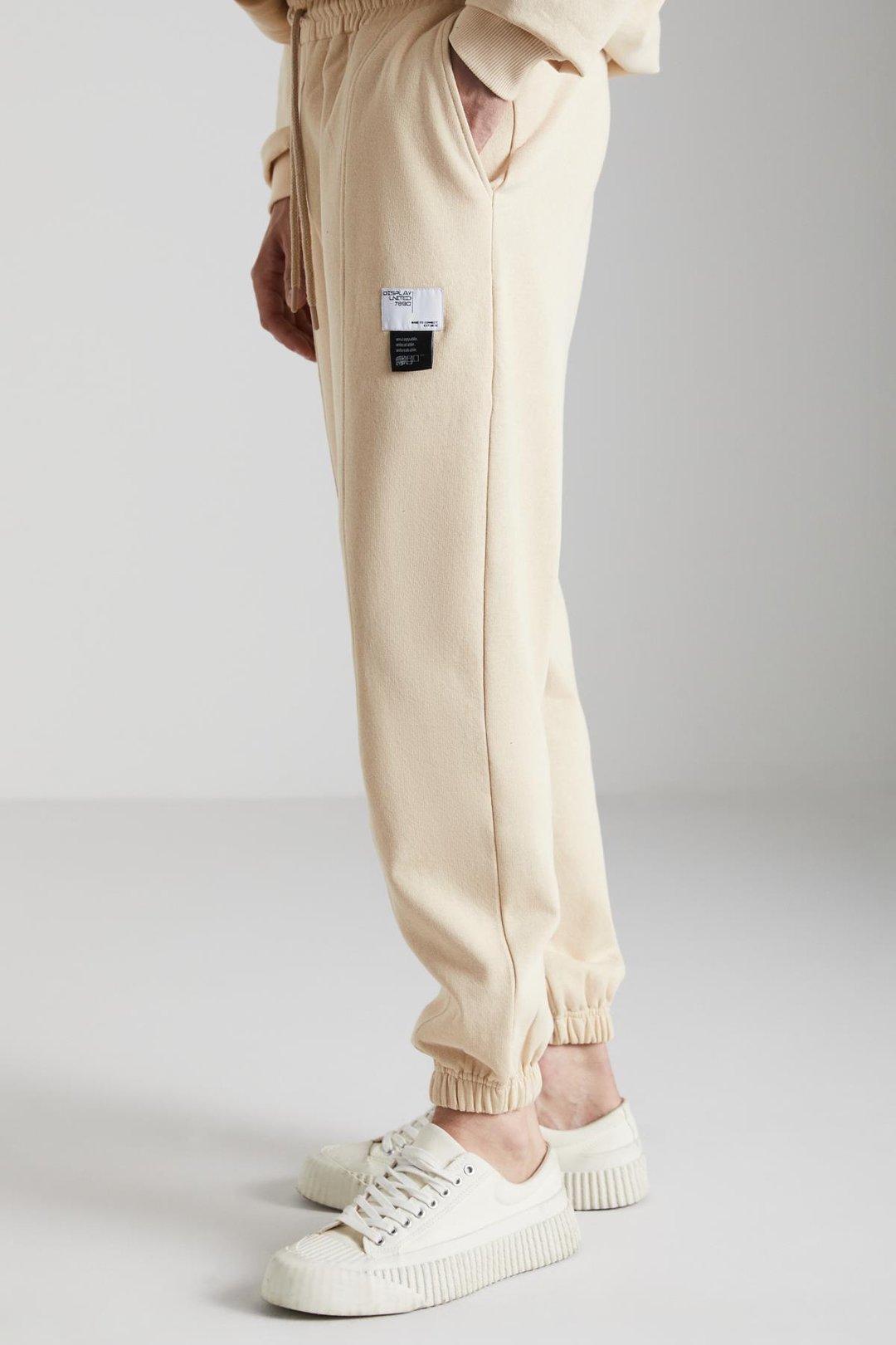 ROWAN Erkek Organik Pamuklu Relaxed Fit İçi Polarlı Süs etiketli Jogger Vanilya Eşofman Altı