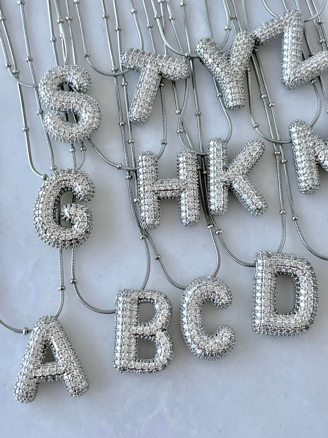 Çelik Gömme Taşlı Bombeli Harf Kolye Gümüş