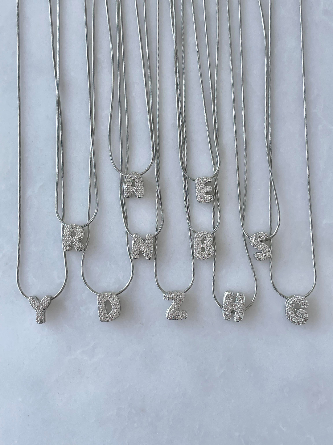 Çelik Gömme Taşlı Harf Kolye Gümüş