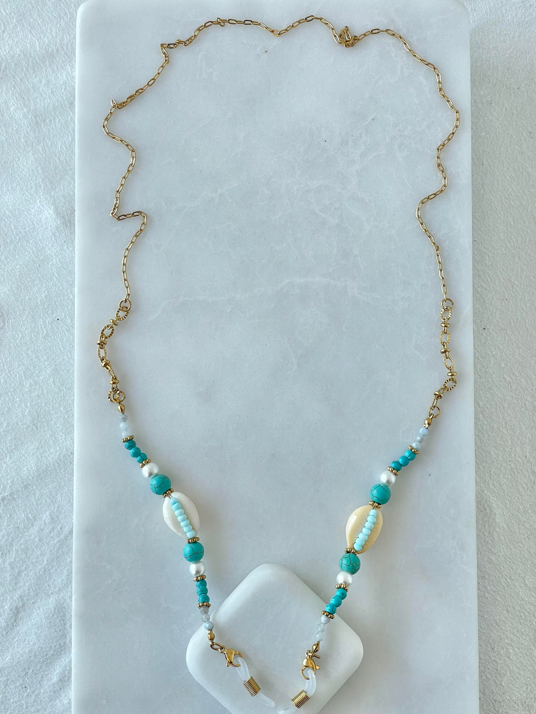 Çelik Deniz Kabuğu ve Mavi Taşlı Gözlük Zinciri Gold