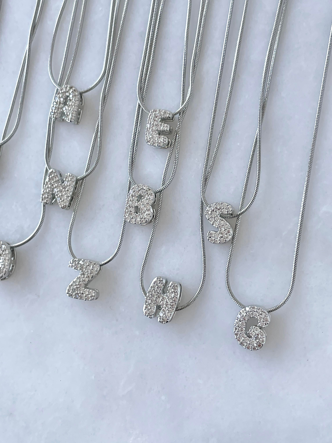 Çelik Gömme Taşlı Harf Kolye Gümüş