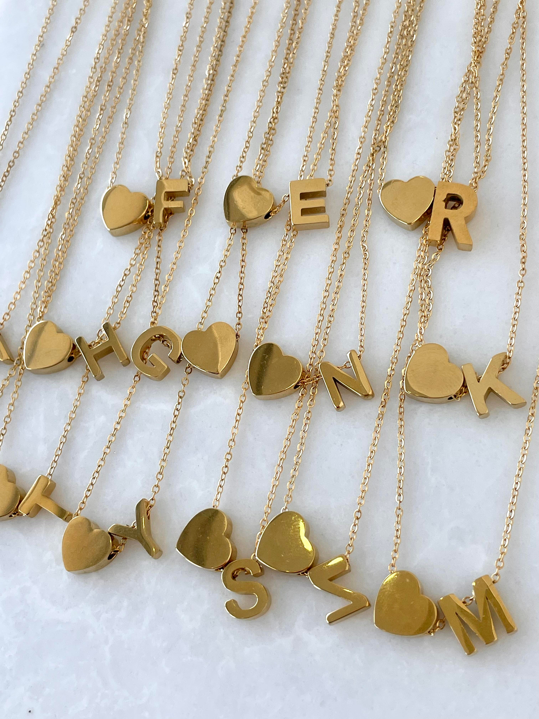 Çelik Kalpli Harf Kolye Gold