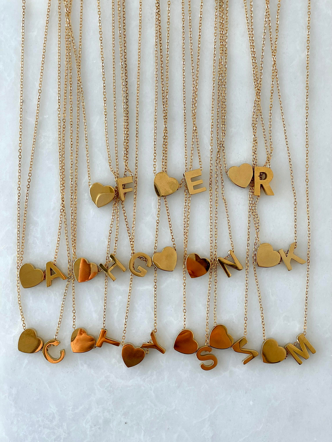 Çelik Kalpli Harf Kolye Gold