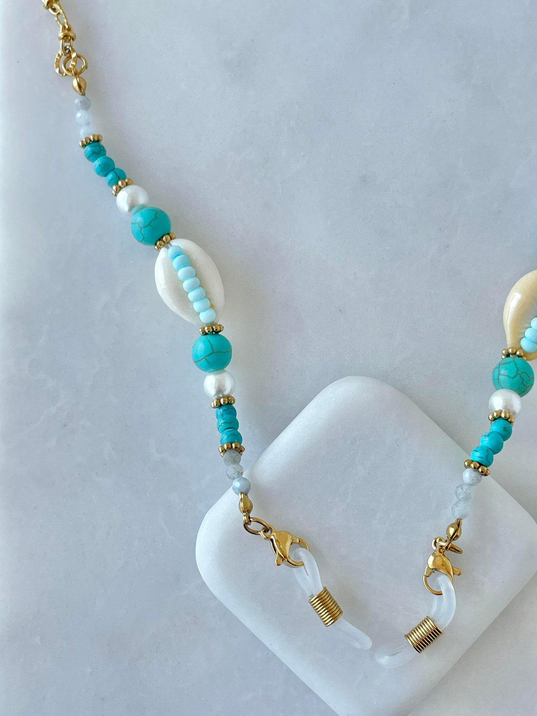 Çelik Deniz Kabuğu ve Mavi Taşlı Gözlük Zinciri Gold