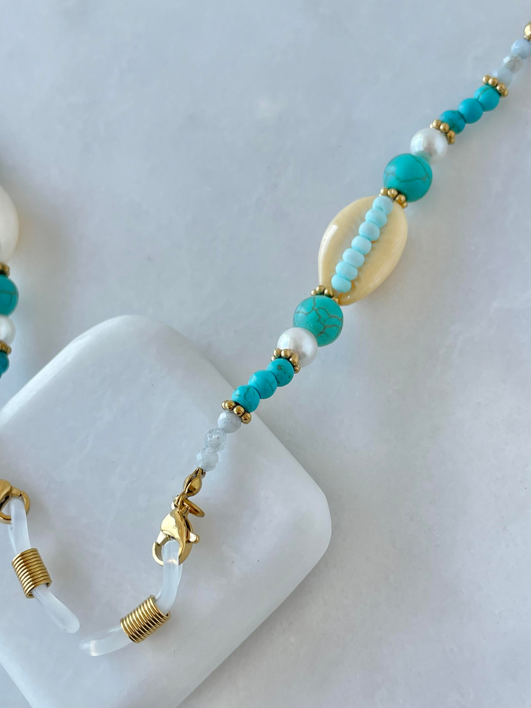 Çelik Deniz Kabuğu ve Mavi Taşlı Gözlük Zinciri Gold