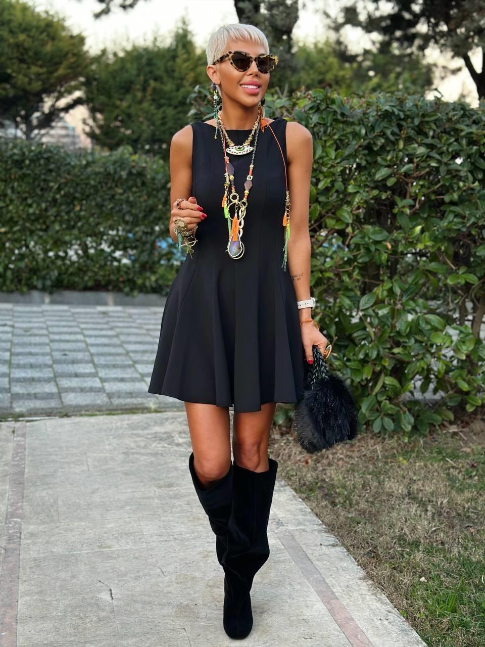 BLACK SLEEVELESS DRESS WITH FLOWY SKIRT