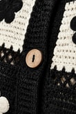 Çiçek Motifli Düğmeli Kroşe Örgü Hırka ve Toparlayıcı Korsajlı Bol Paça Pantolon KombiniÇiçek Motifli Hırka ve Korsajlı Pantolon Kombini | İstangül ButikHAZIR KOMBİNLERİSTANGÜL BUTİK