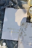 Ekru ve Altın Işıltılı Pastel Kır Çiçekleri Tasarımlı Nişan Davetiyesi