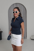 I}