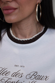 I}