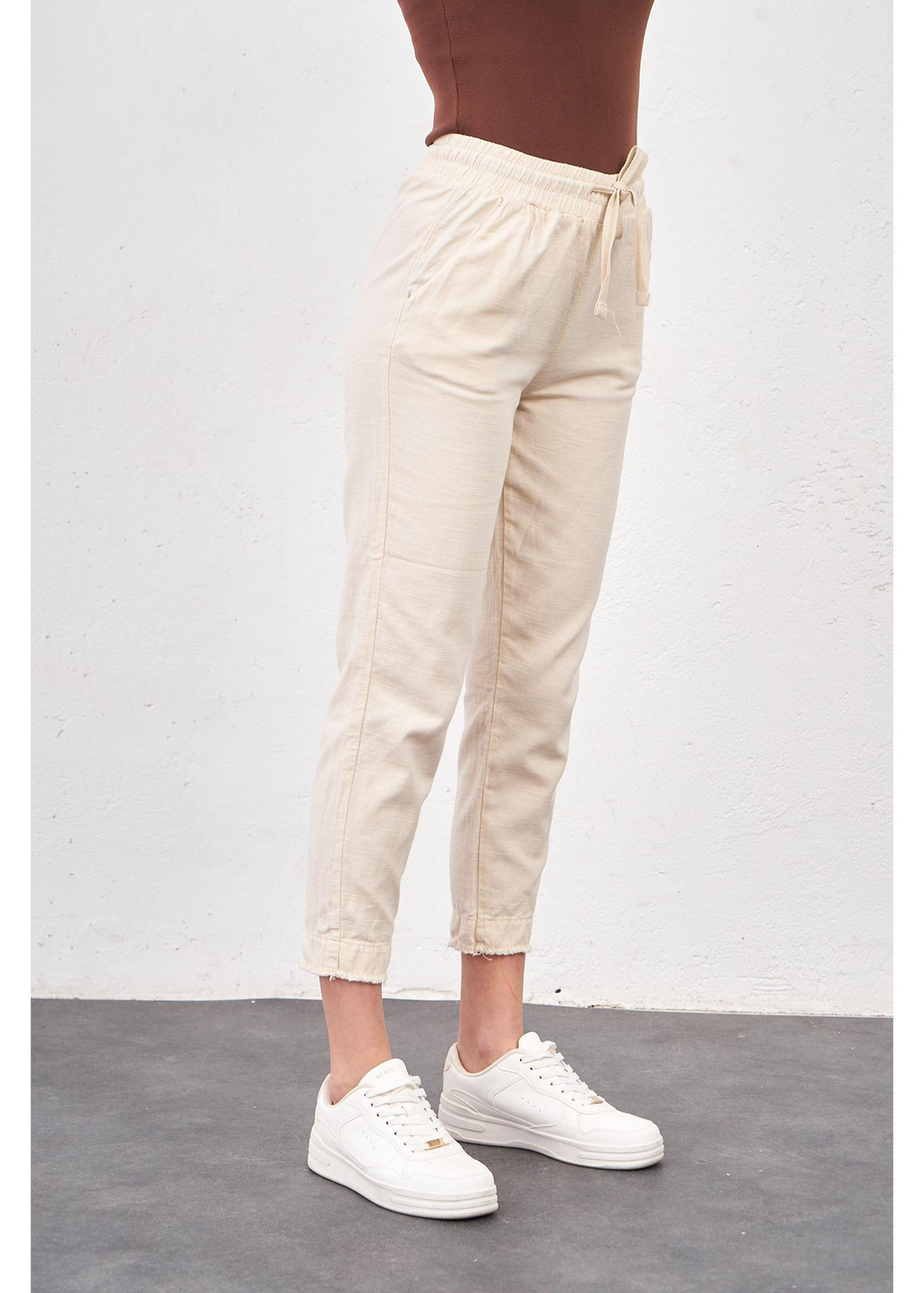 Paçası Püsküllü Gabardin Pantolon-Krem