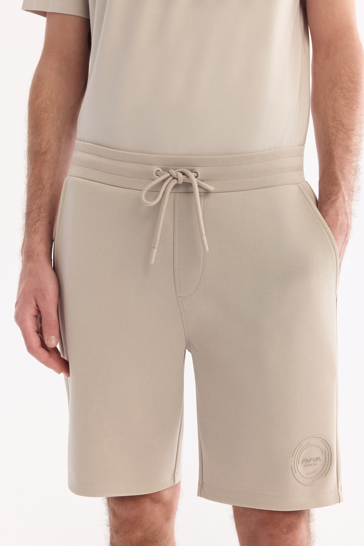Bej Beli Lastikli Bağcıklı Yandan Cepli Gofre Baskı Detaylı Soft Touch  Örme Şort