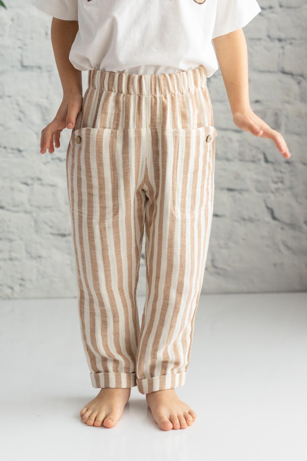 ERKEK BEBEK CEP DETAYLI MUSLIN PANTOLON