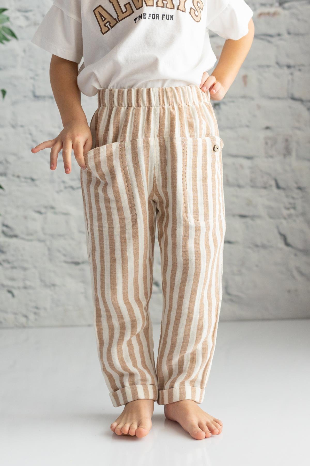 ERKEK BEBEK CEP DETAYLI MUSLIN PANTOLON