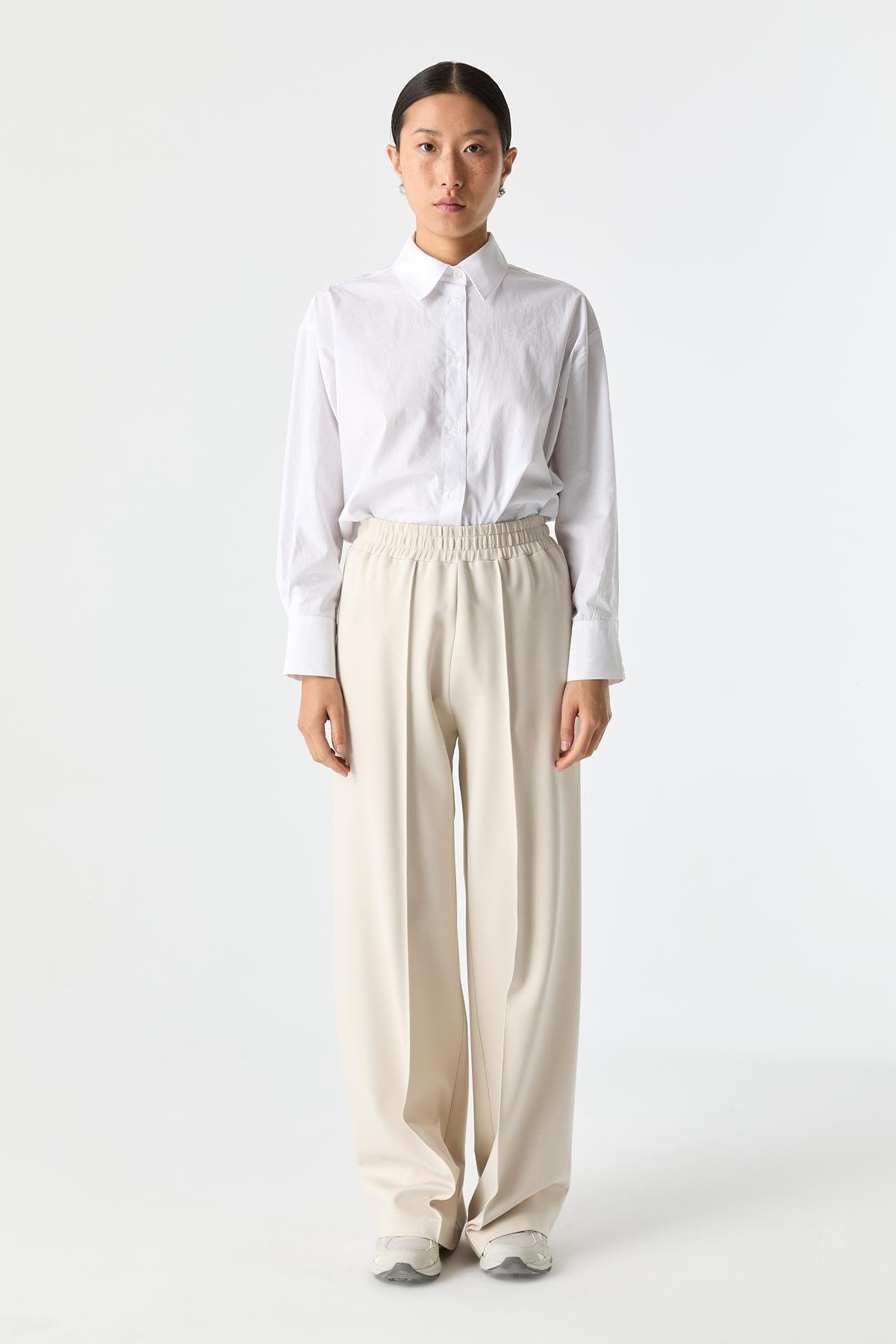 Esnek Dokulu Bol Paça Pantolon{KATEGORİ}