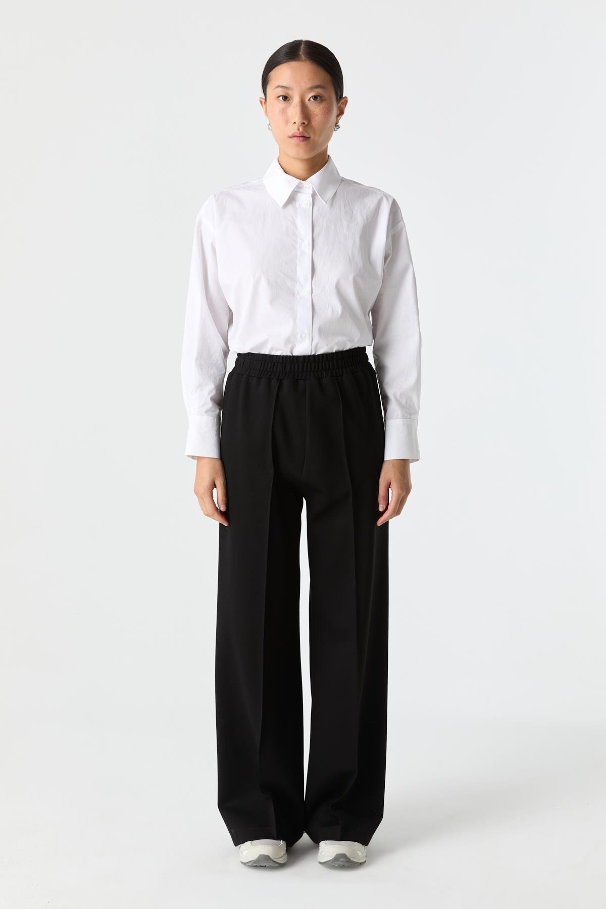 Esnek Dokulu Bol Paça Pantolon{KATEGORİ}