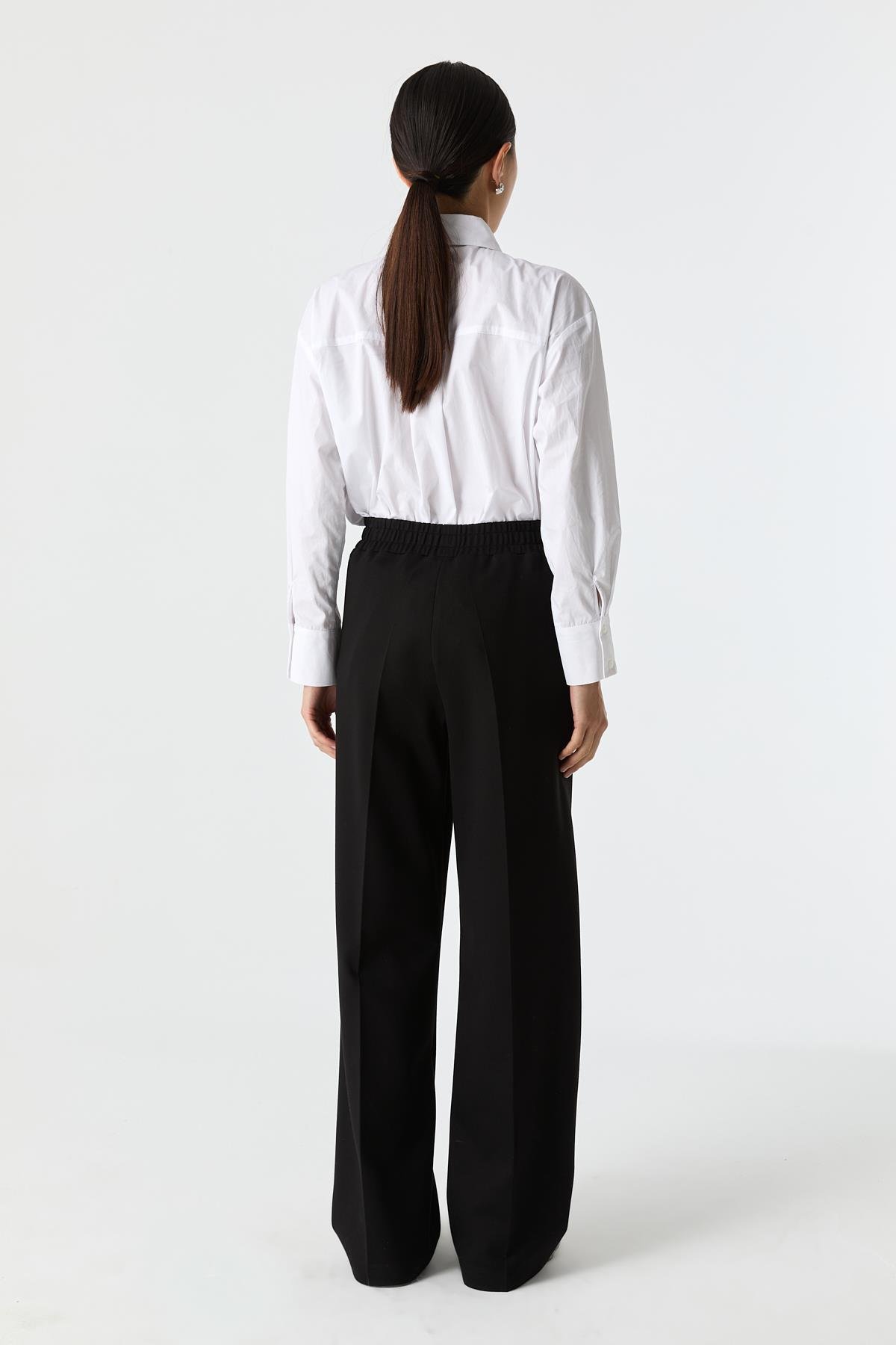 Esnek Dokulu Bol Paça Pantolon{KATEGORİ}