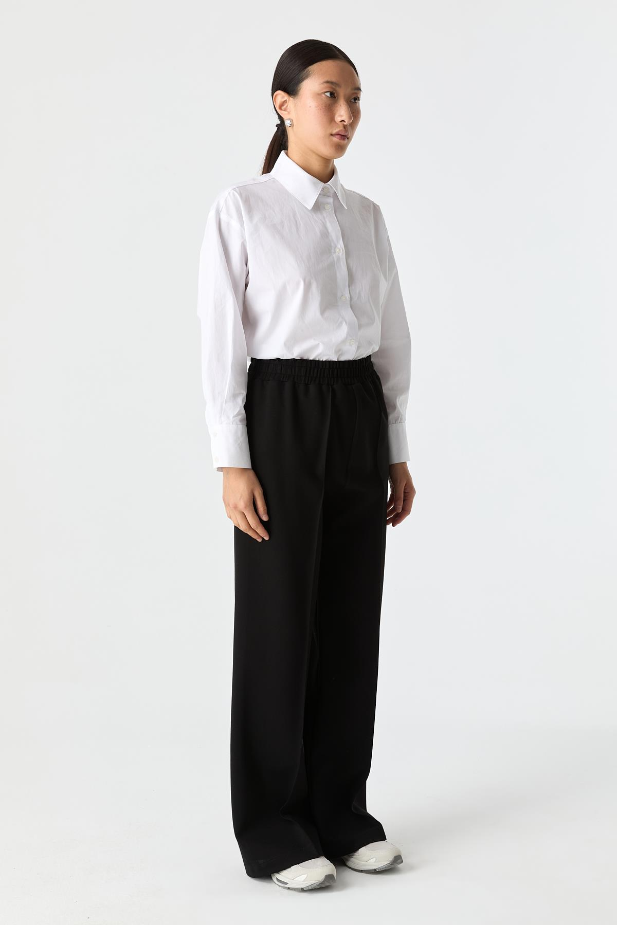 Esnek Dokulu Bol Paça Pantolon{KATEGORİ}