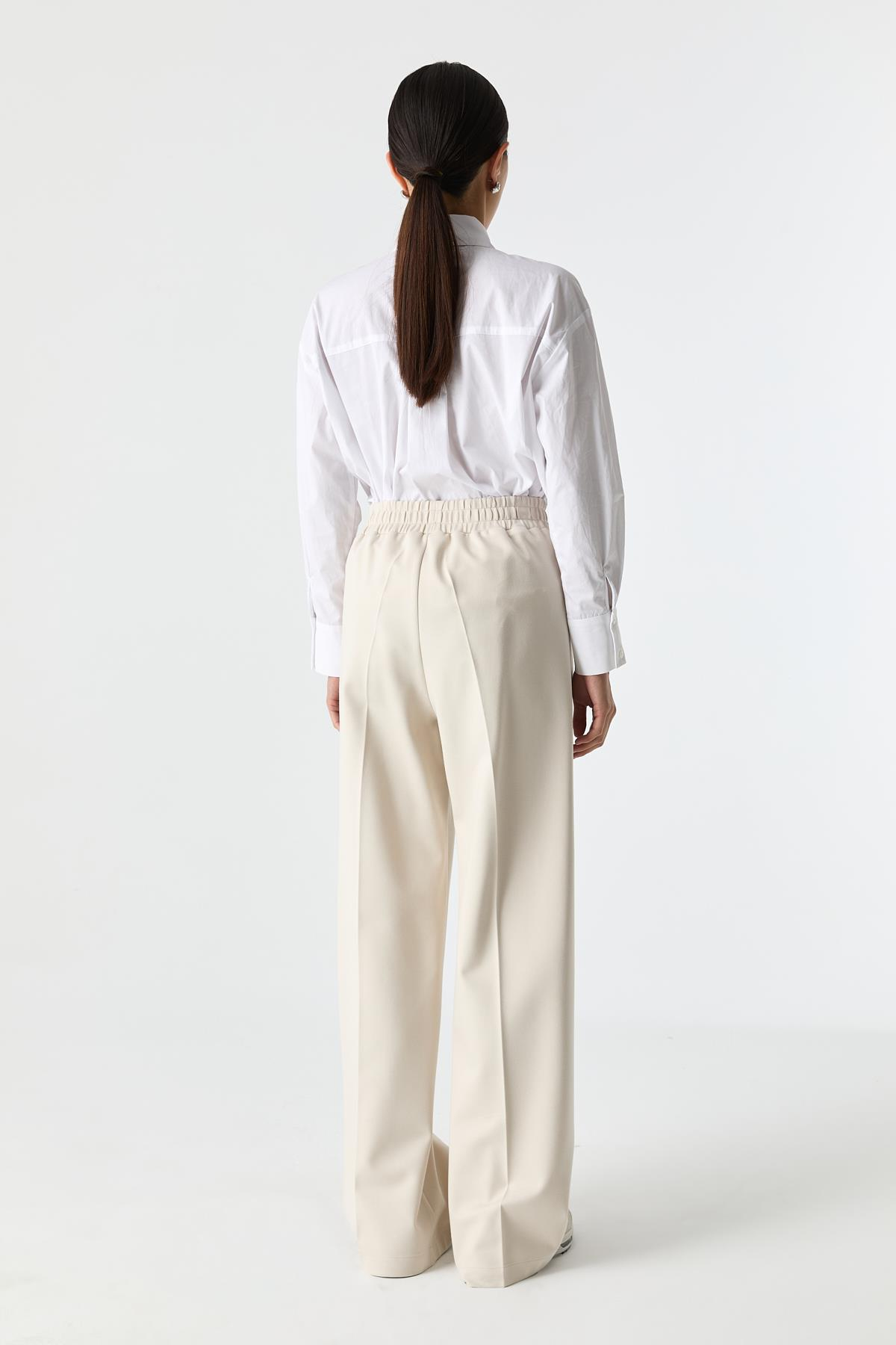 Esnek Dokulu Bol Paça Pantolon{KATEGORİ}