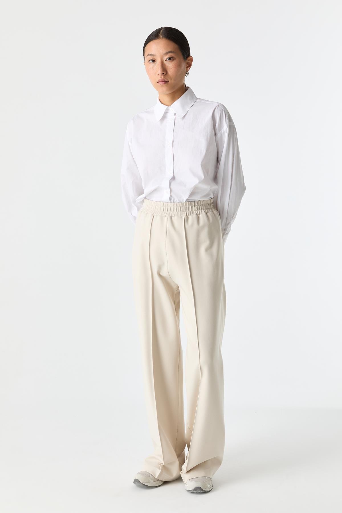 Esnek Dokulu Bol Paça Pantolon{KATEGORİ}