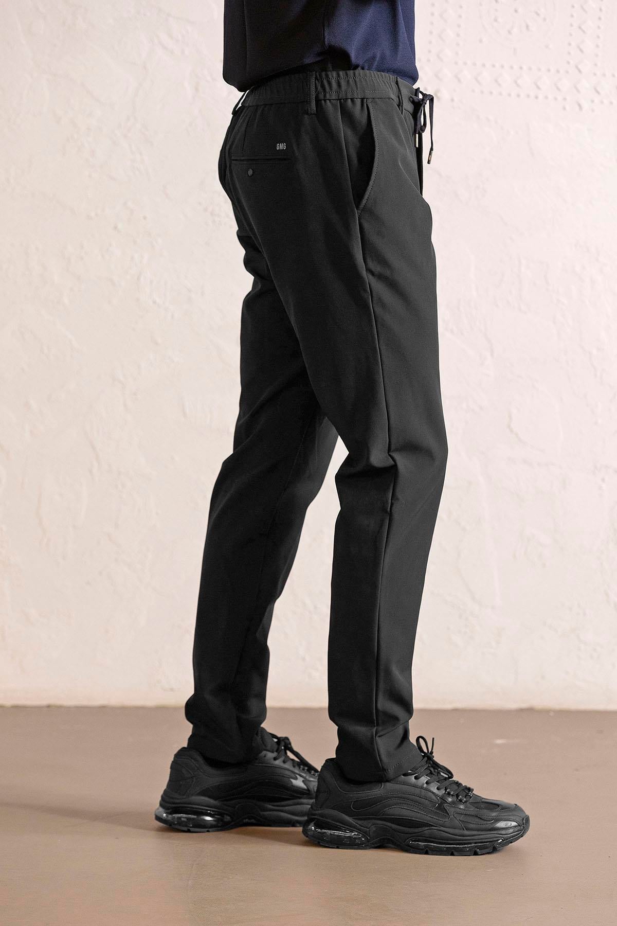 Beli Lastikli ve Bağcıklı Cepleri Çıtçıtlı Jogger Erkek Pantolon