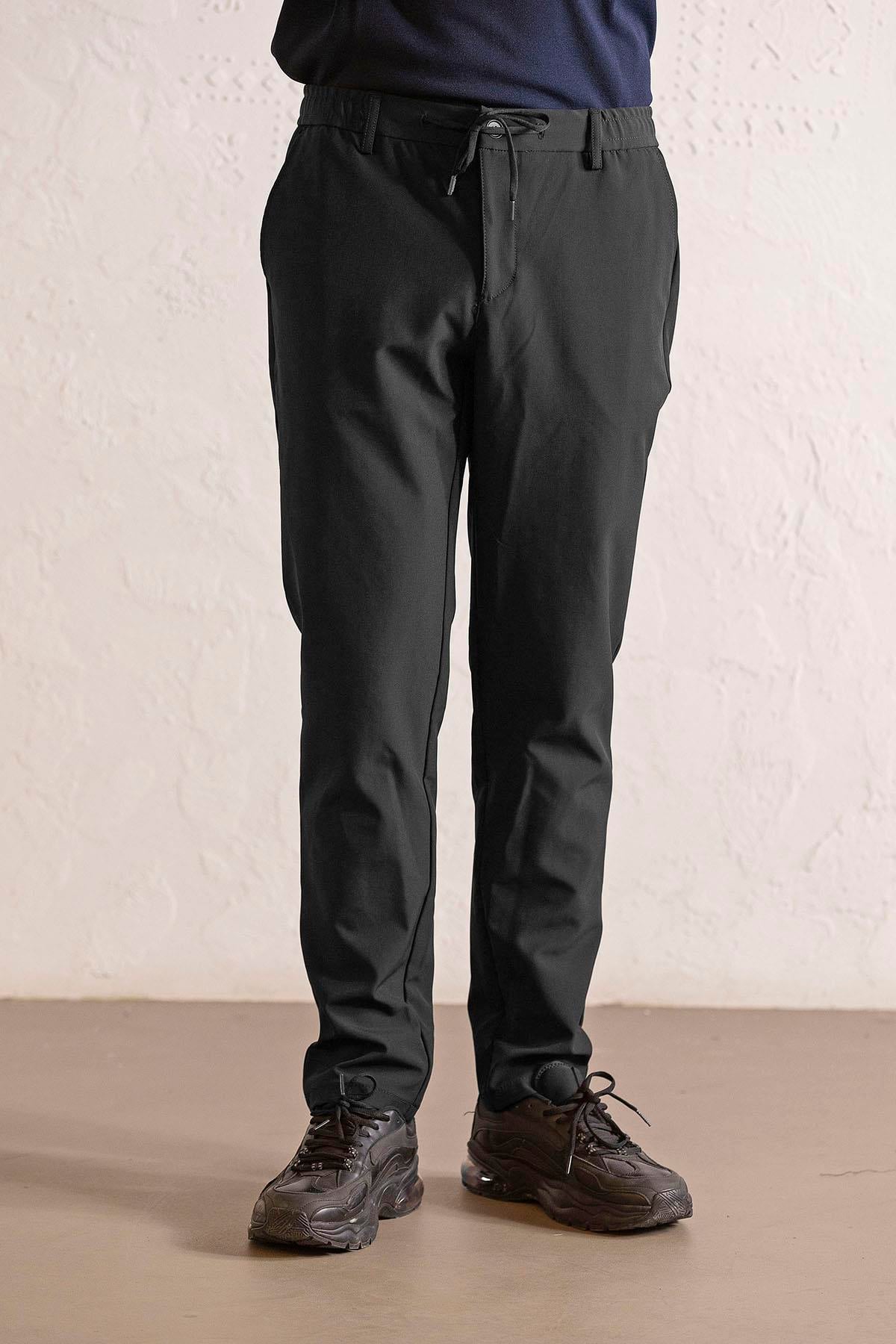 Beli Lastikli ve Bağcıklı Cepleri Çıtçıtlı Jogger Erkek Pantolon
