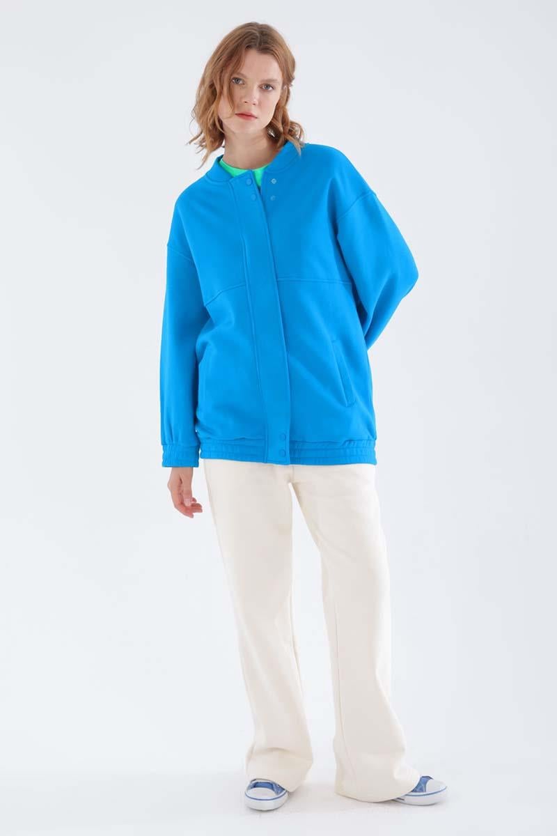 Cardigan zippé bleu à boutons-pression