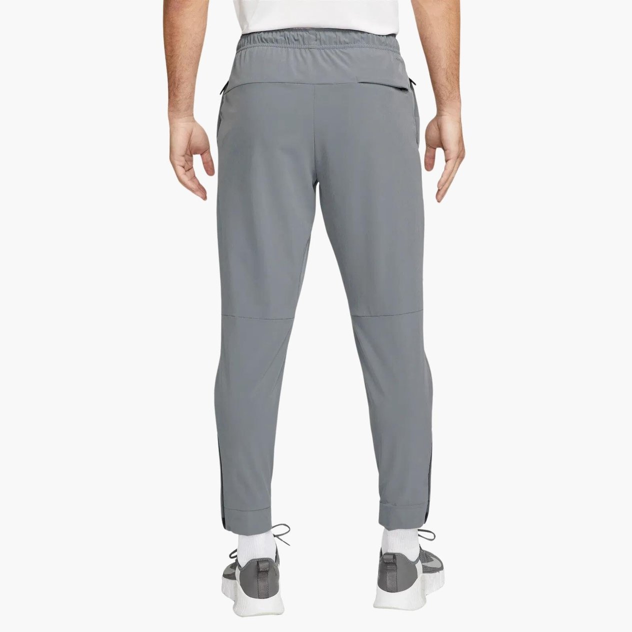 Nike Dri-FIT Unlimited Bileğe Doğru Daralan Eşofman Altı
