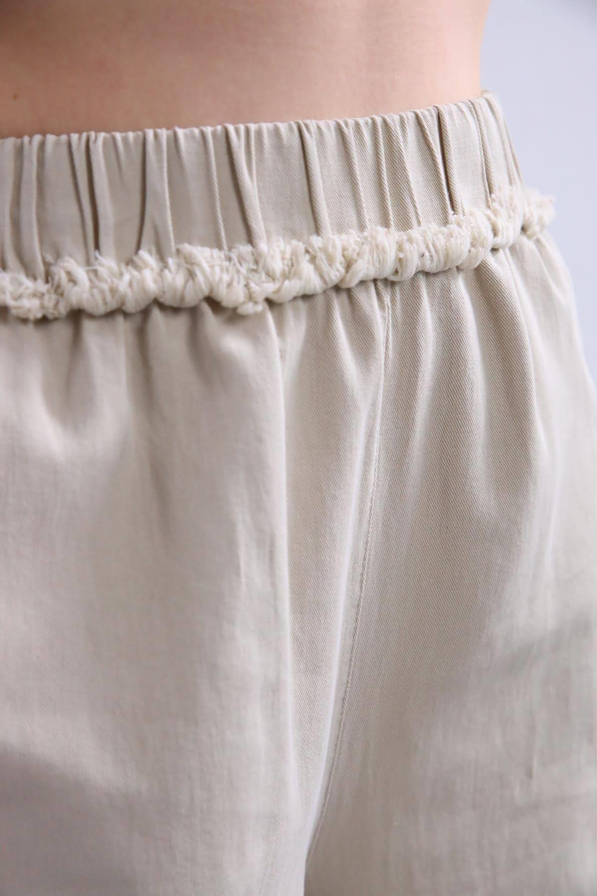 Bej Paçası Detaylı Püsküllü Pantolon - Şaman Butik Bej Paçası Detaylı Püsküllü Pantolon