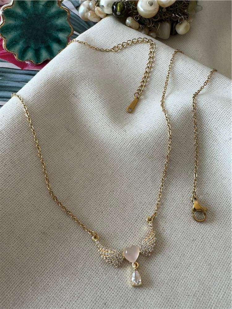 Çelik Gold Wing Kolye