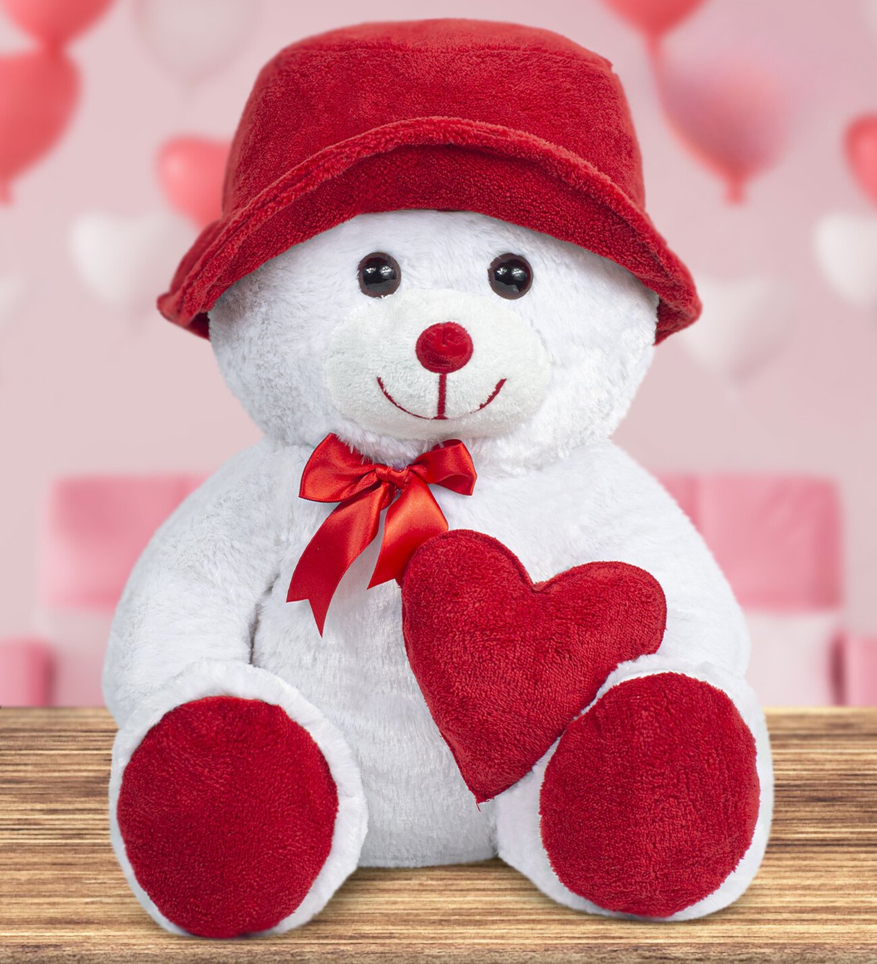 Teddybär mit Hut und Herz