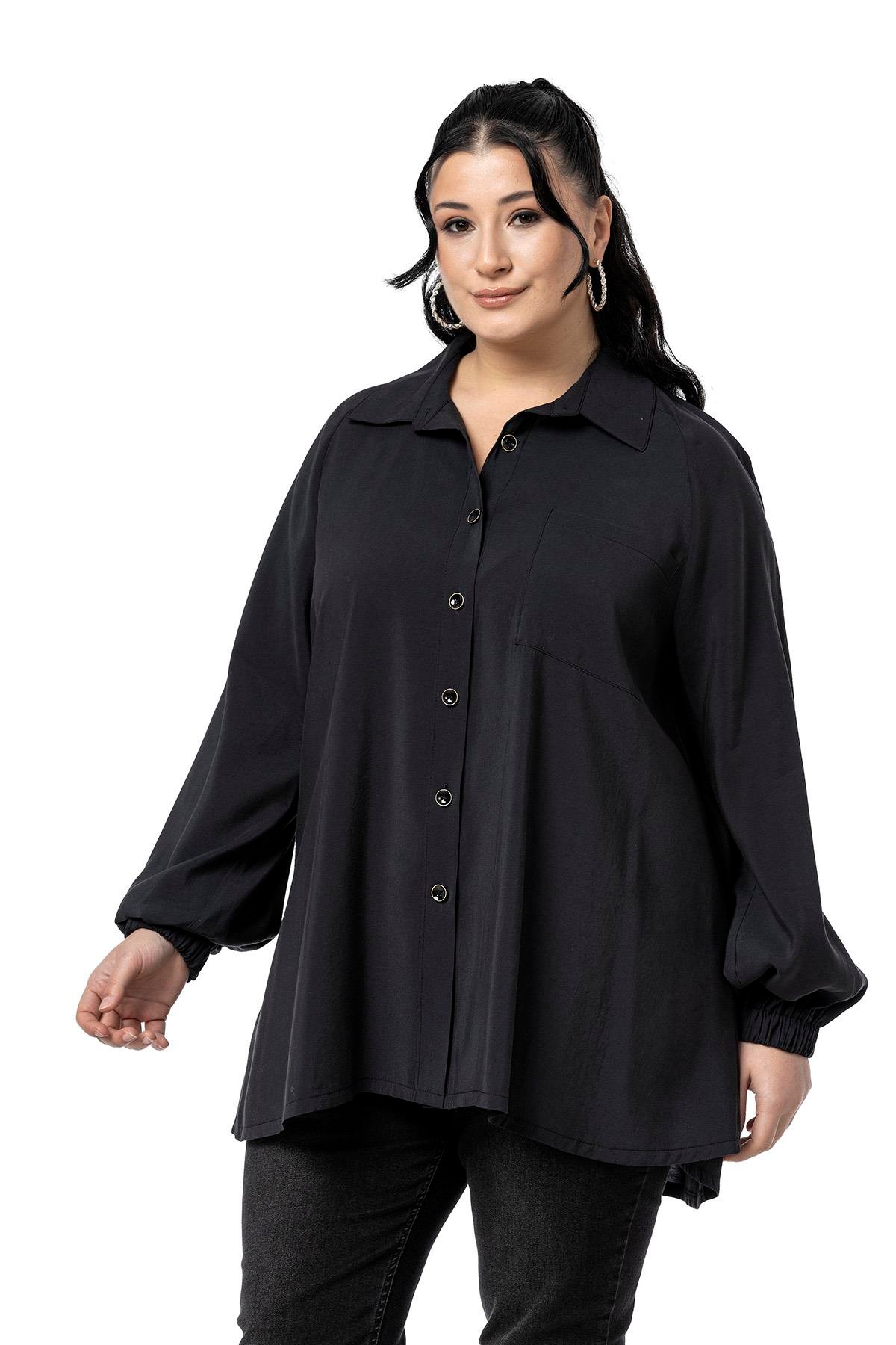 Disentis Modest Büyük Beden Kol Ağzı Lastikli Geniş Kesim Reglan Kol Siyah GömlekDISENTIS MODESTBüyük Beden Kol Ağzı Lastikli Geniş Kesim Reglan Kol Siyah Gömlek