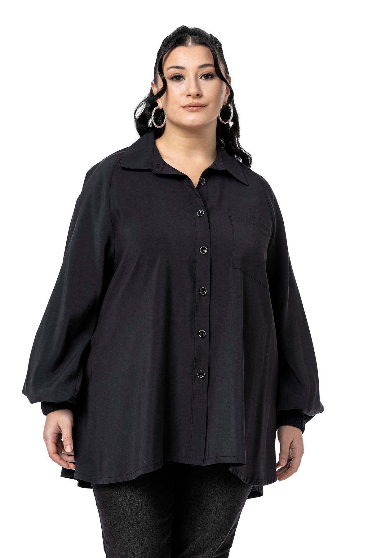 Disentis Modest Büyük Beden Kol Ağzı Lastikli Geniş Kesim Reglan Kol Siyah GömlekDISENTIS MODESTBüyük Beden Kol Ağzı Lastikli Geniş Kesim Reglan Kol Siyah Gömlek