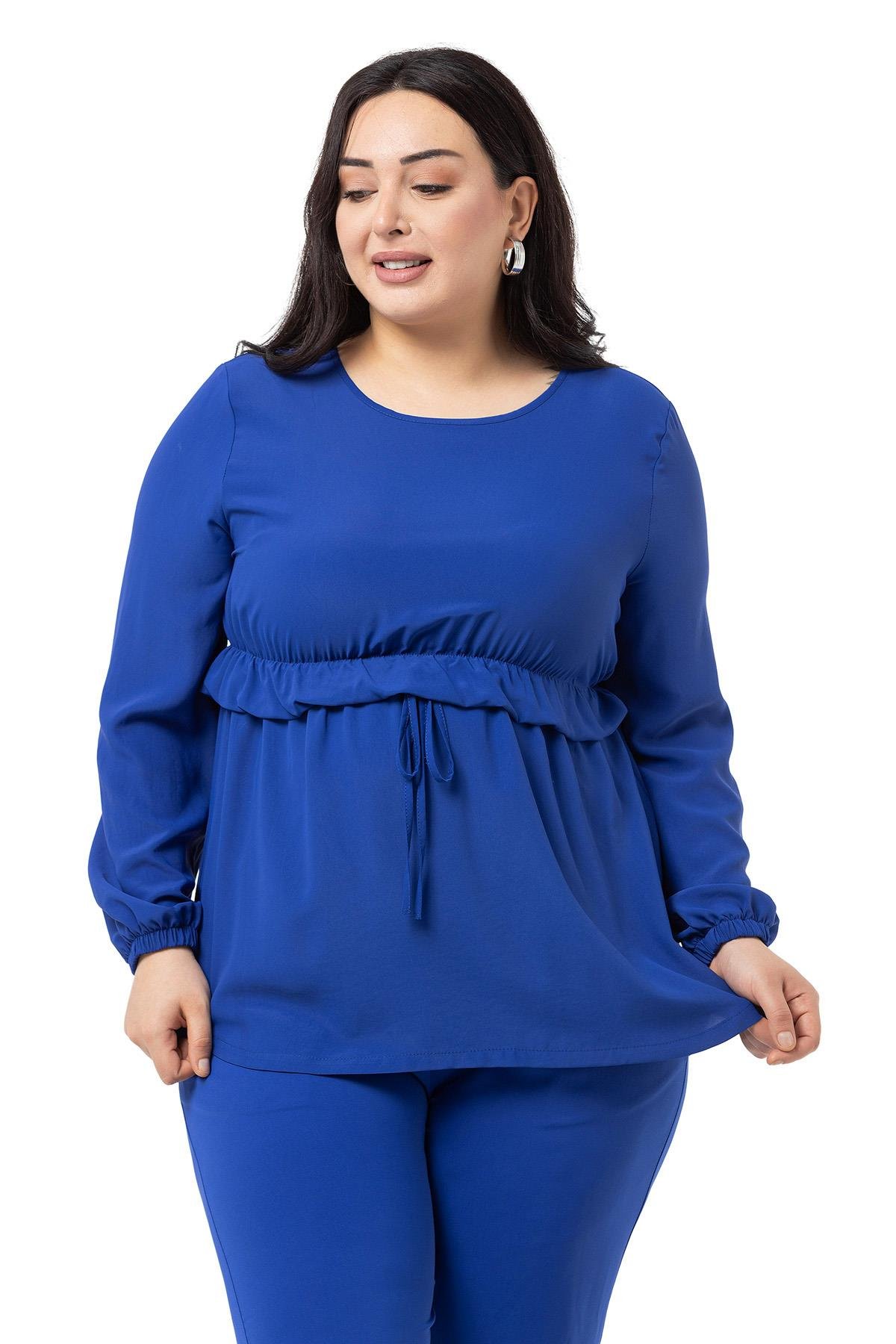 TEK KALANLARDisentis Modest Beli Tünelli Uzun Kollu Tensel Kumaş Saks Mavisi BluzDISENTIS MODESTBüyük Beden Beli Tünelli Uzun Kollu Tensel Kumaş Saks Mavisi Bluz