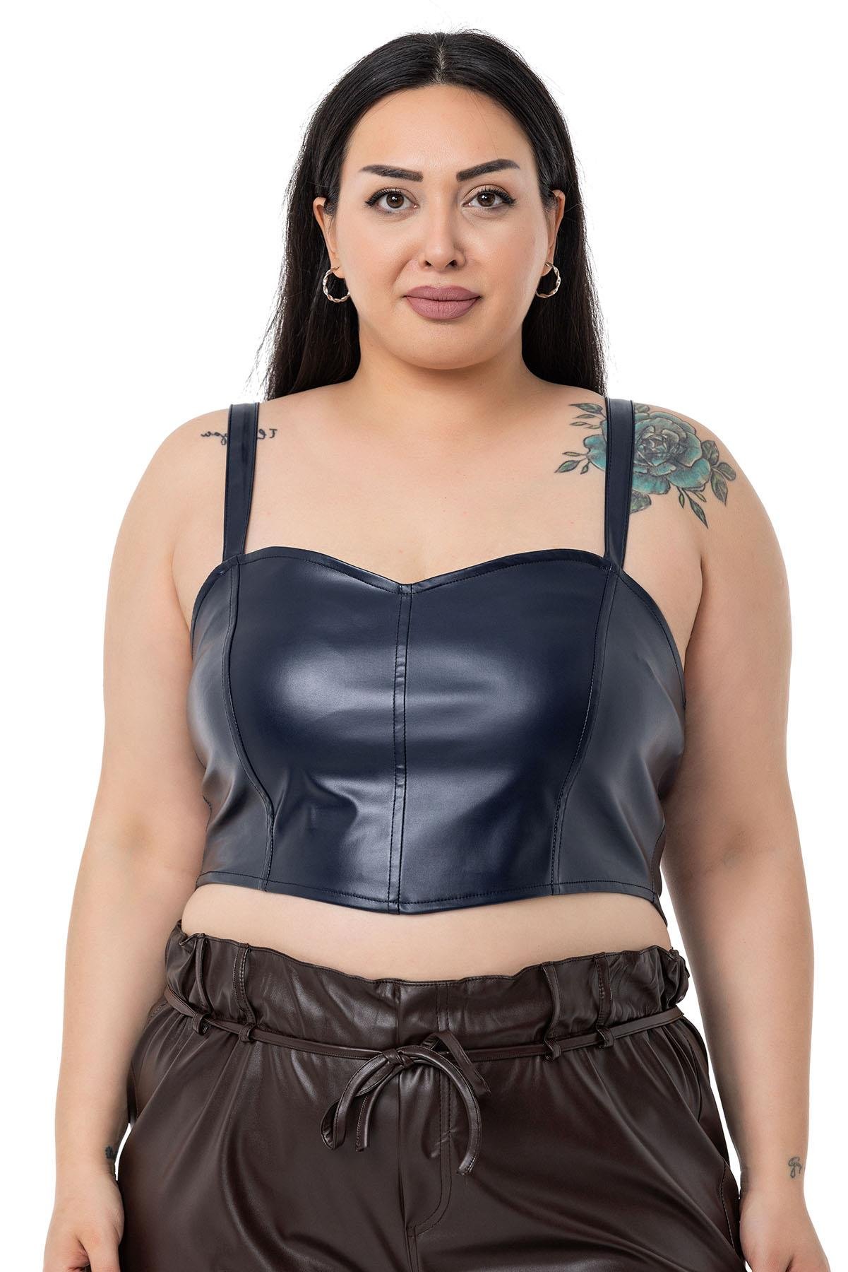 TopsDISENTIS DERI BUSTIYER CROP TOP DISENTIS MODEST GENC BUYUK BEDENDISENTIS MODESTBüyük Beden Ayarlanabilir İnce Askılı Crop Deri Lacivert Büstiyer