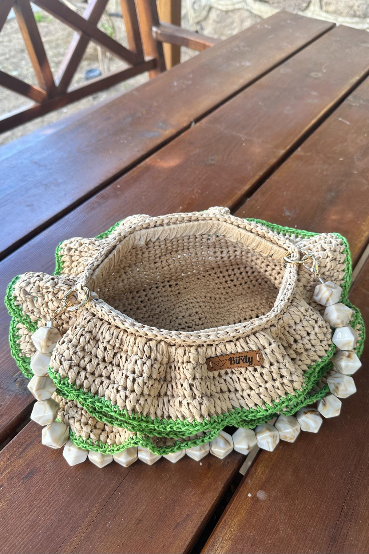 Mgebutik Bej El Yapımı Rafya İp Fırfırlı El ve Kol ÇantasıMgebutik Bej El Yapımı Rafya İp Fırfırlı El ve Kol Çantası