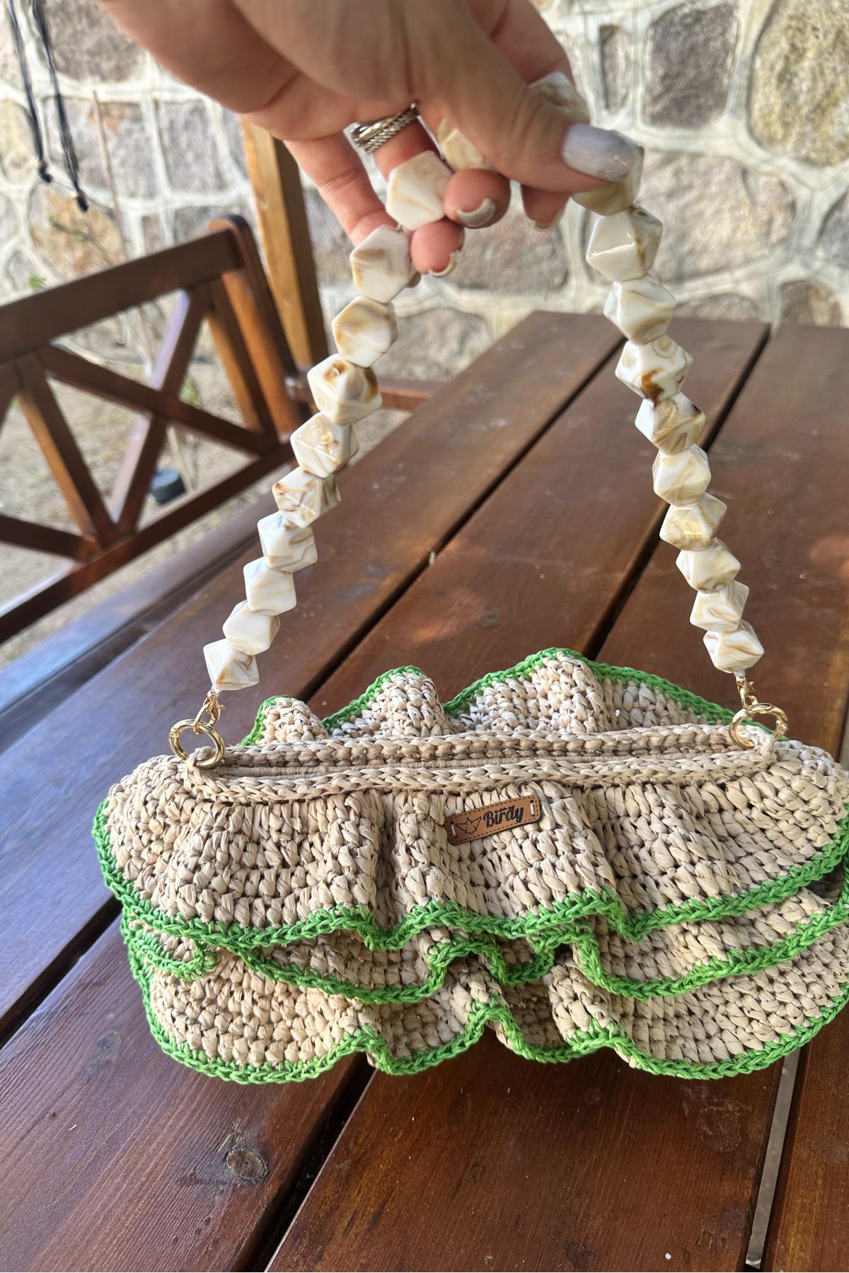 Mgebutik Bej El Yapımı Rafya İp Fırfırlı El ve Kol ÇantasıMgebutik Bej El Yapımı Rafya İp Fırfırlı El ve Kol Çantası