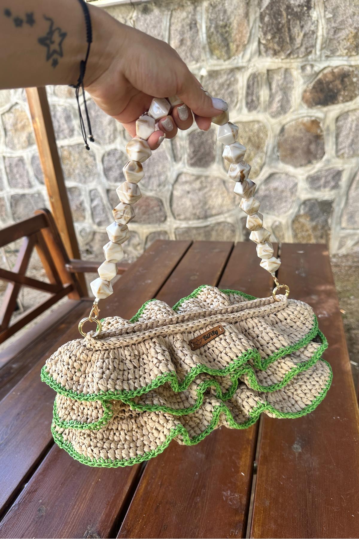 Mgebutik Bej El Yapımı Rafya İp Fırfırlı El ve Kol ÇantasıMgebutik Bej El Yapımı Rafya İp Fırfırlı El ve Kol Çantası