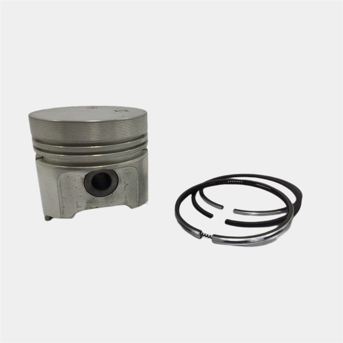 PISTON + JEU DE SEGMENTS (0.50 - DIAMÈTRE: 85.50 mm): KUBOTA / D1402 / V1902 / RÉFÉRENCE NOMBRE: 19274-21910-S